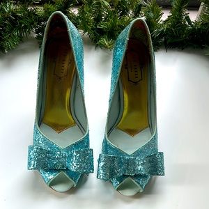 Blue glitter shoe with a 3 inch heel from Ted Baker lightly worn
